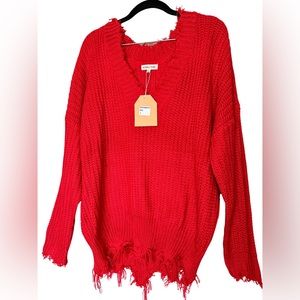 Main Strip. Distressed hem knit sweater. Size L